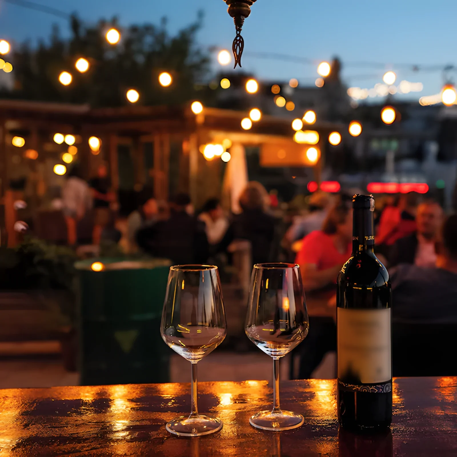 Evening at Nomads Roof, two glasses and Cappadocian wine